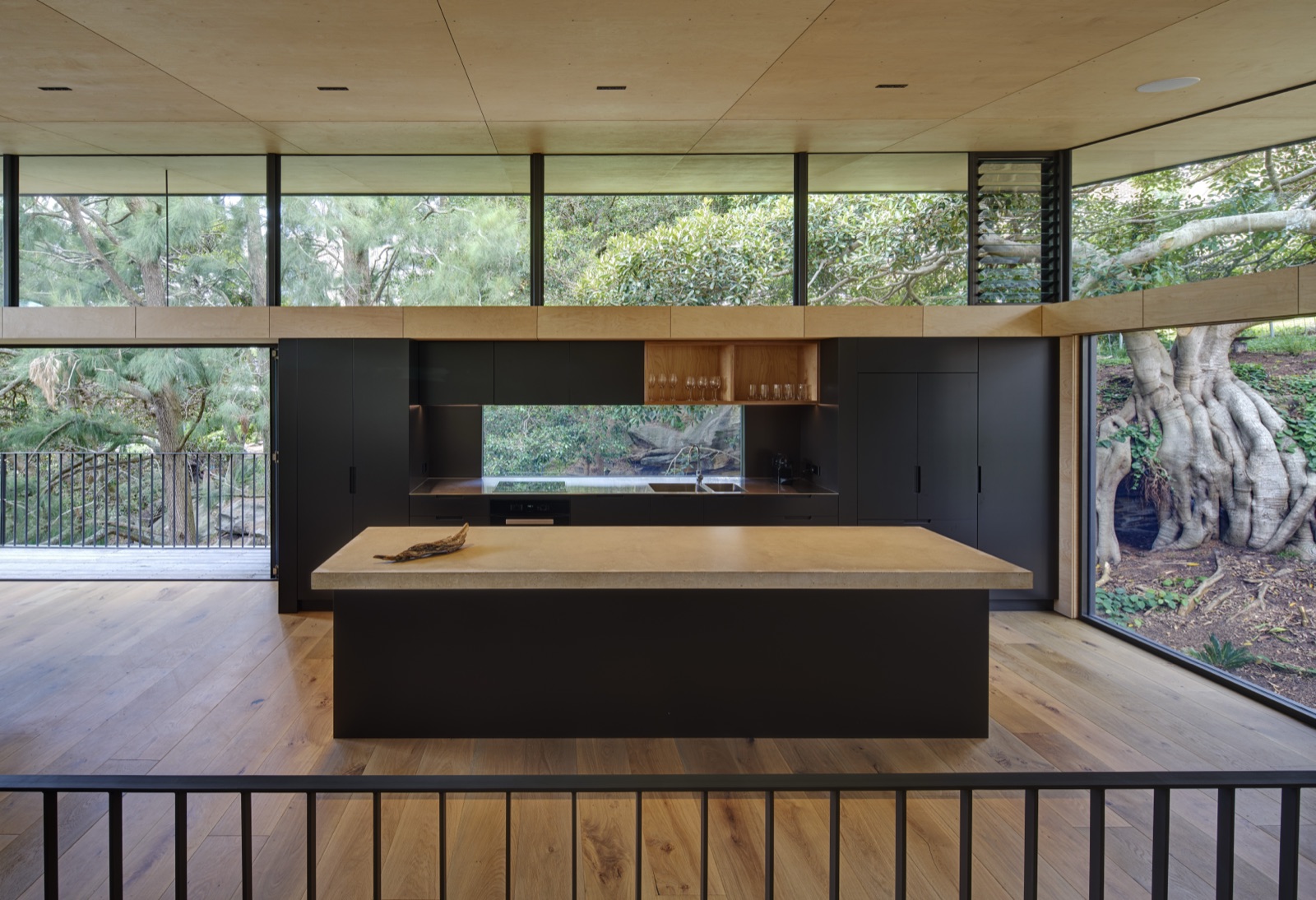Bundeena bushland kitchen — timber island and dark joinery